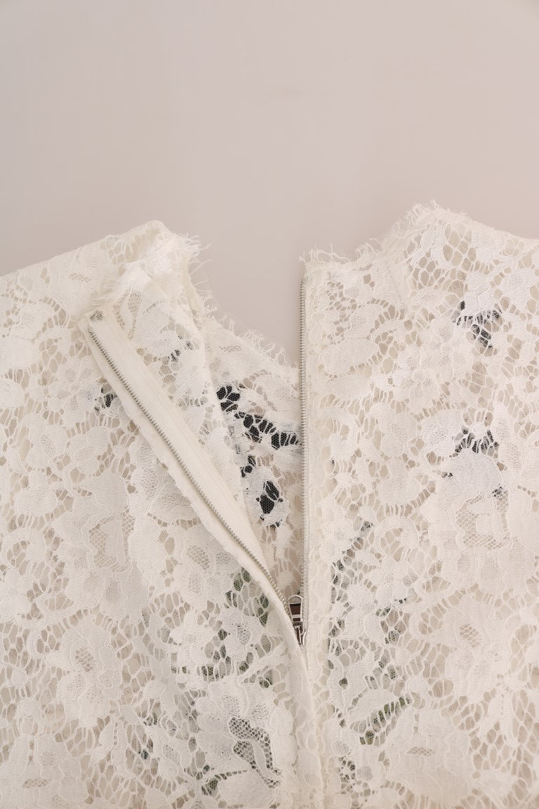 Witte blouse met kant en kristallen