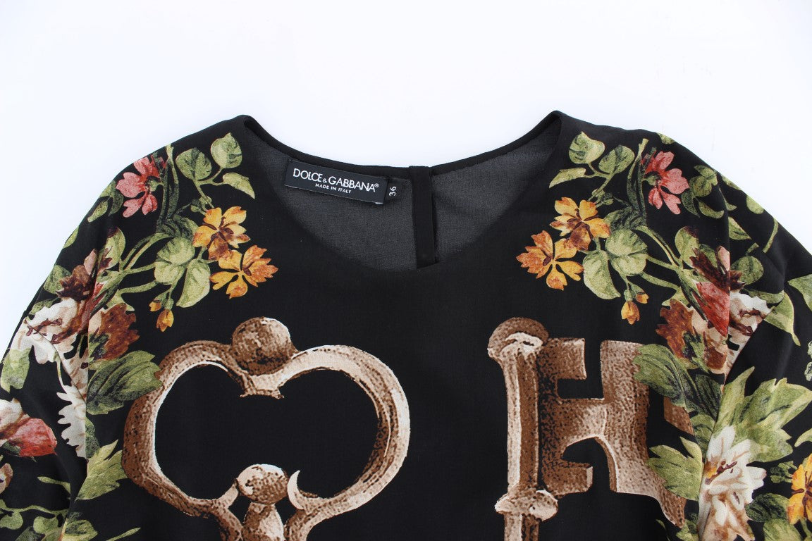 Zwarte blouse met bloemenprint van zijde