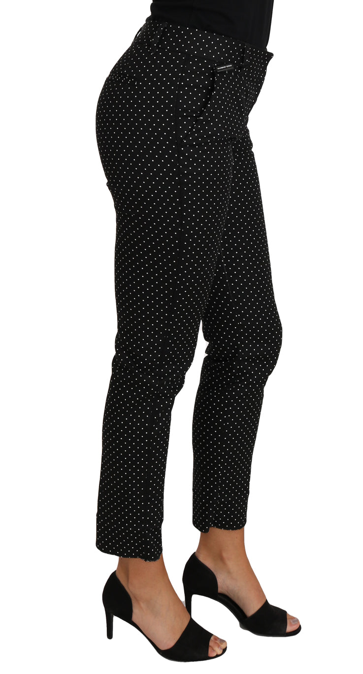 Zwarte jurk met stippen en rechte broek