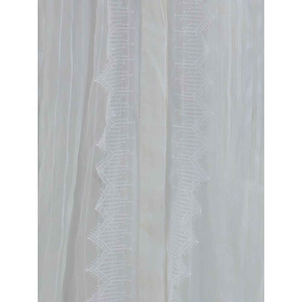 Blouse van geplooide zijden mousseline en kant