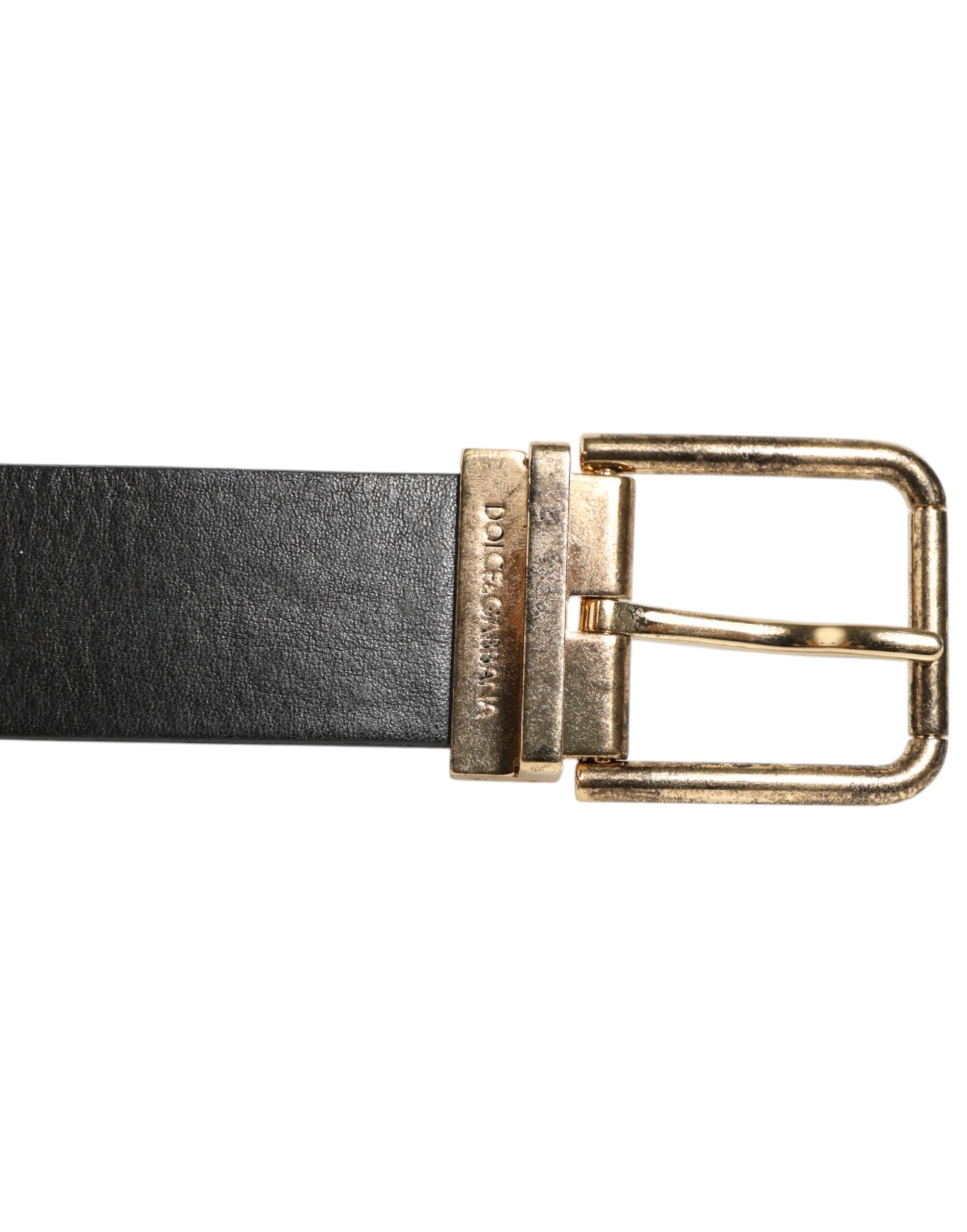 Zwarte leren riem met gouden en zilveren muntgesp