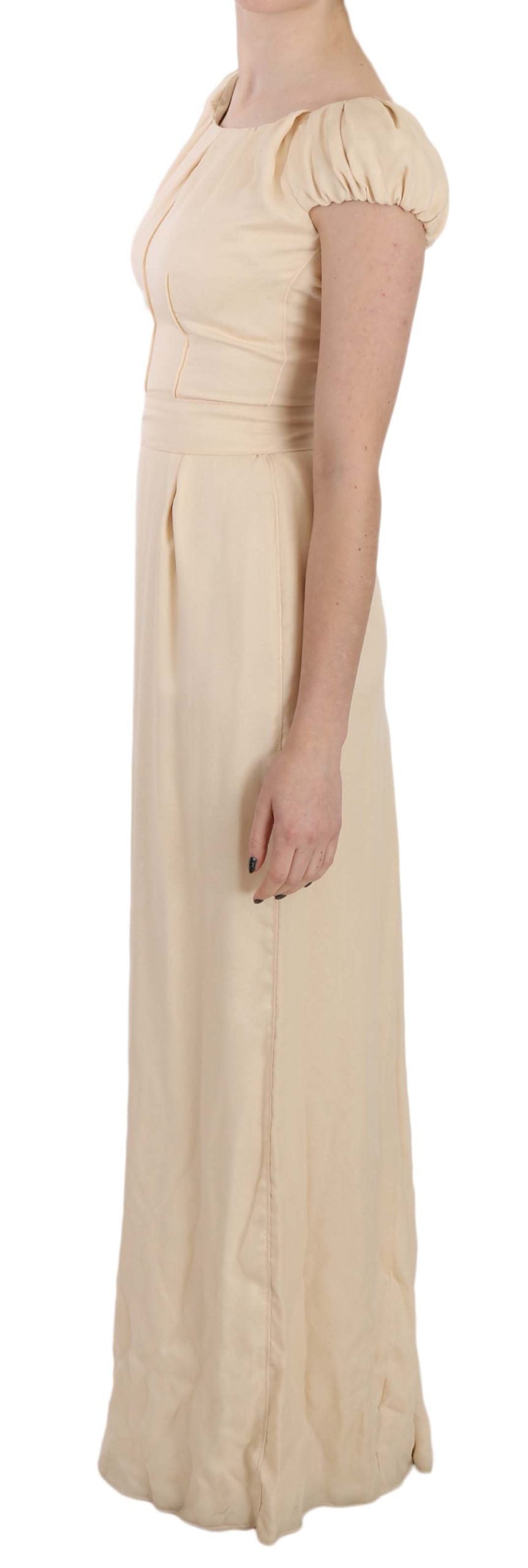 Beige zijden jurk met zuilvormige mouwen
