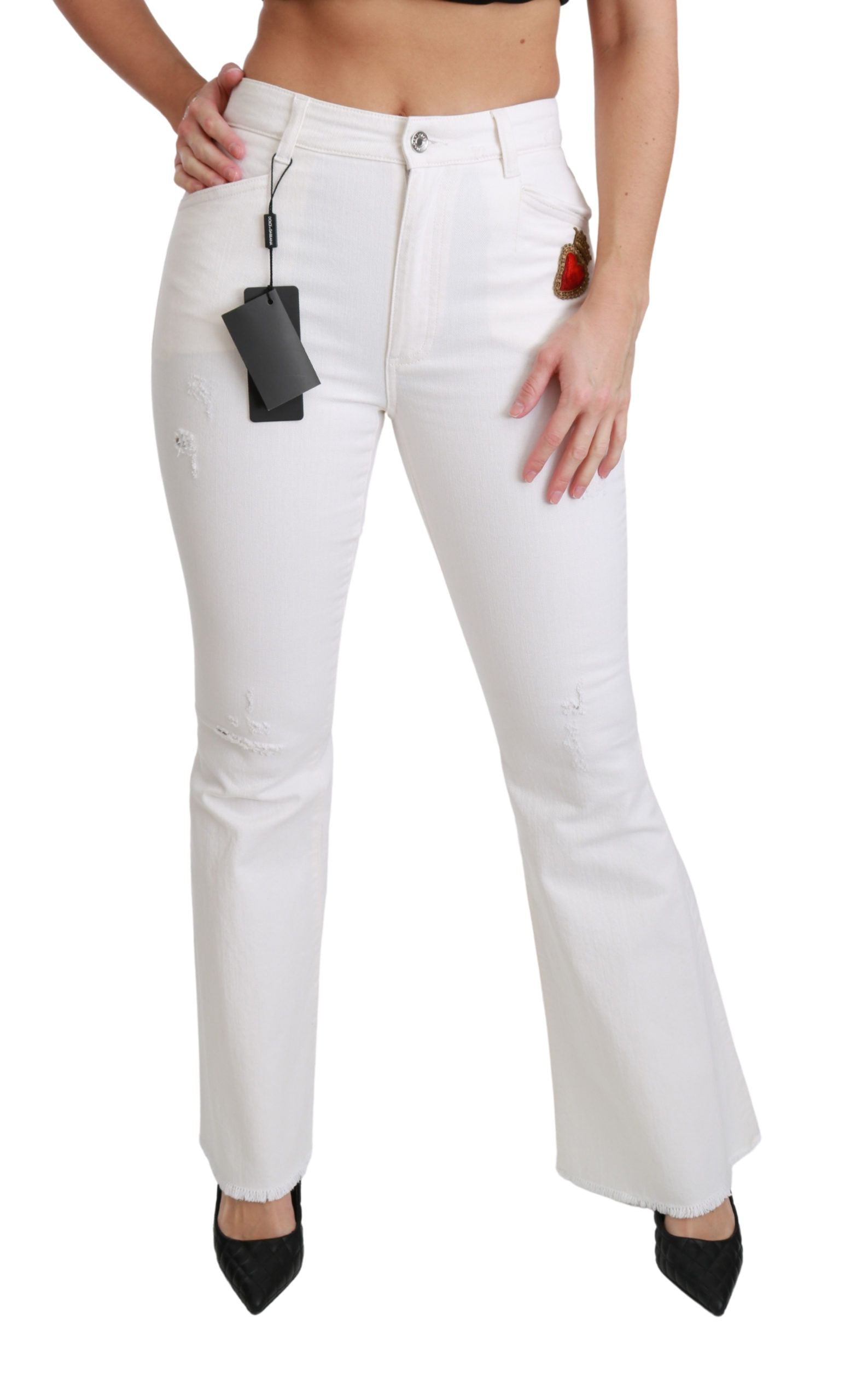 Witte, uitlopende stretchkatoenen broek met hartjesmotief