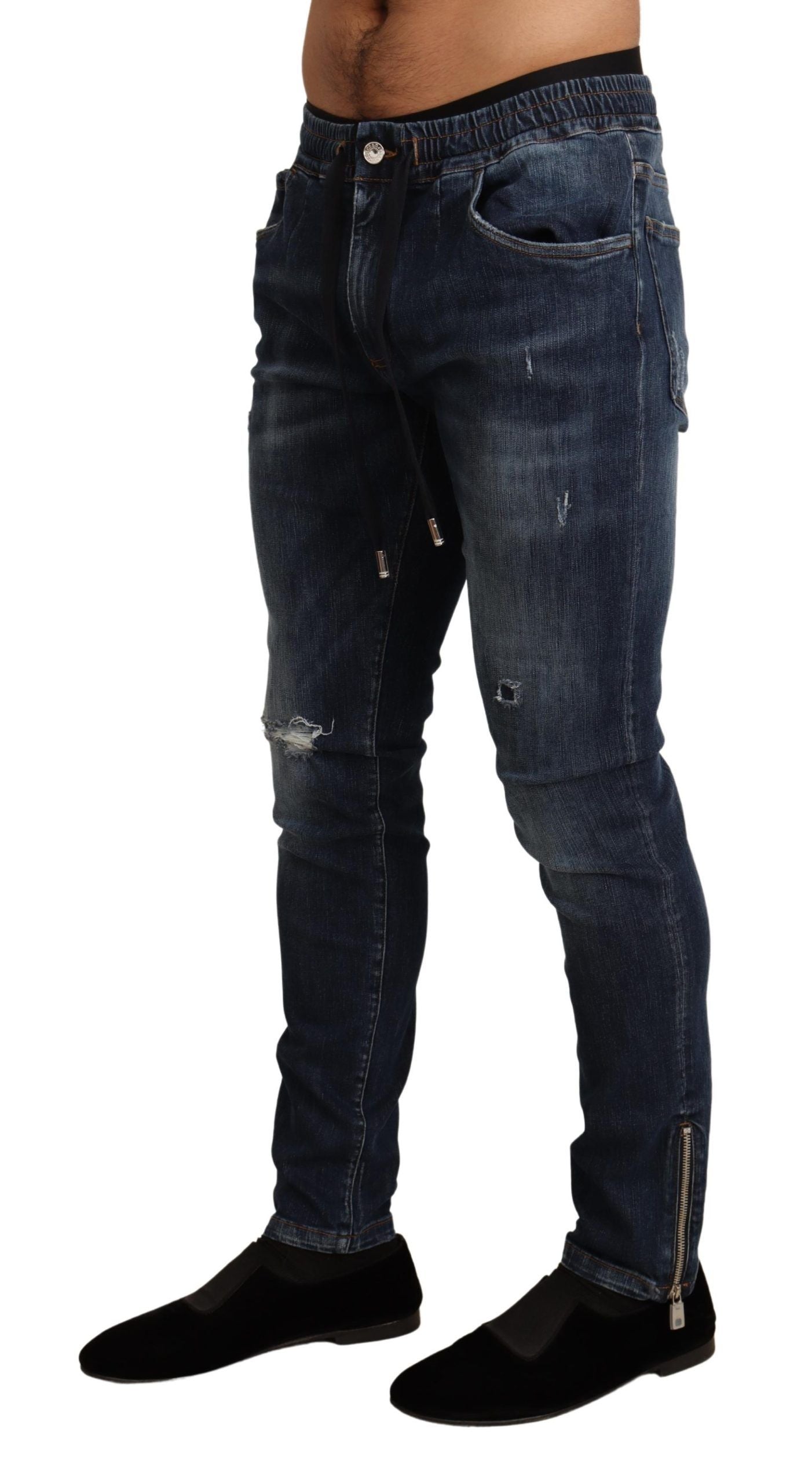 Blauwe katoenen stretch jeans met gescheurde spijkerbroek
