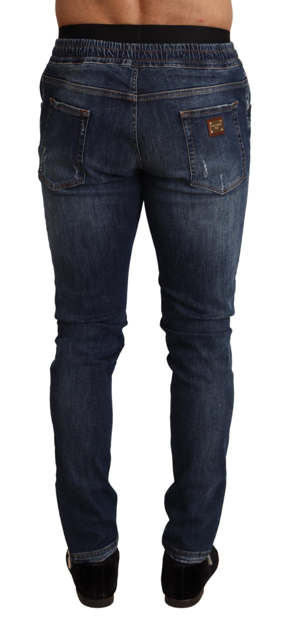 Blauwe katoenen stretch jeans met gescheurde spijkerbroek