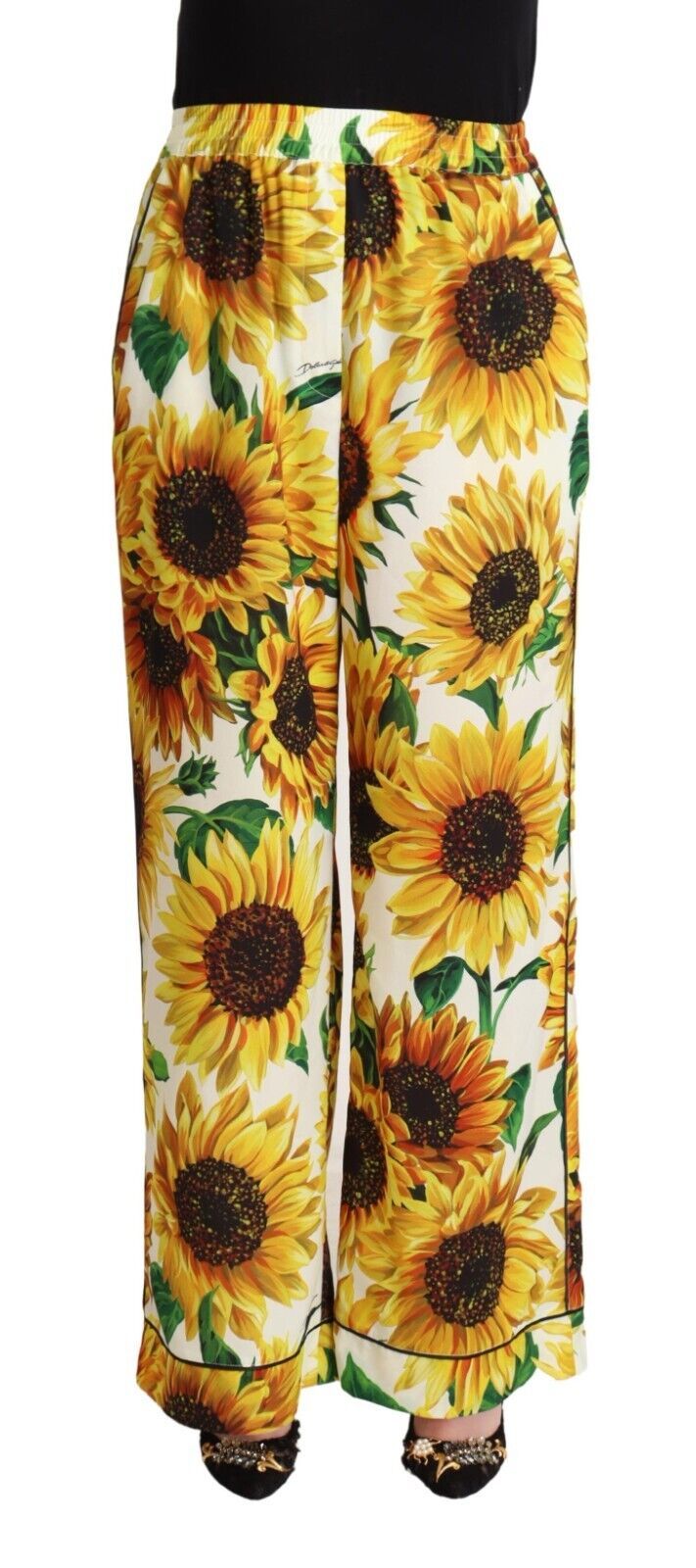 Witte zonnebloemprint broek met wijde pijpen en middelhoge taille