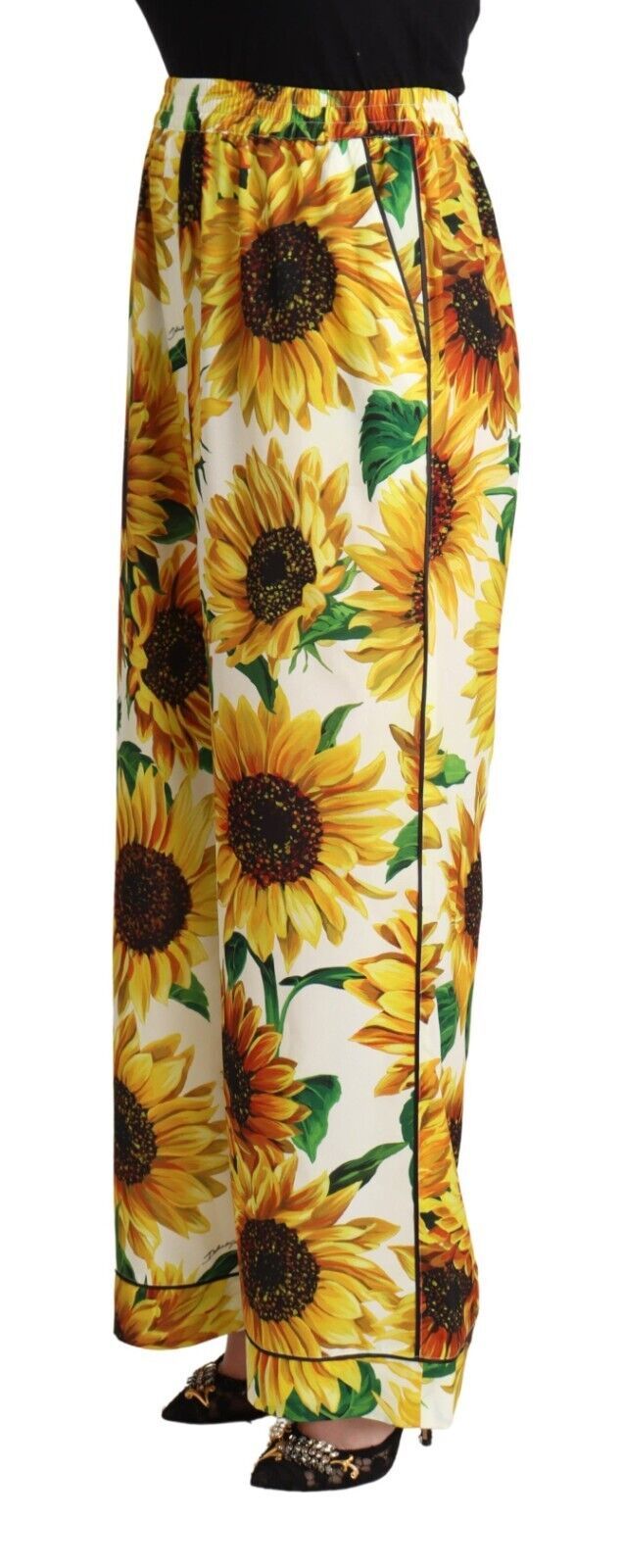 Witte zonnebloemprint broek met wijde pijpen en middelhoge taille