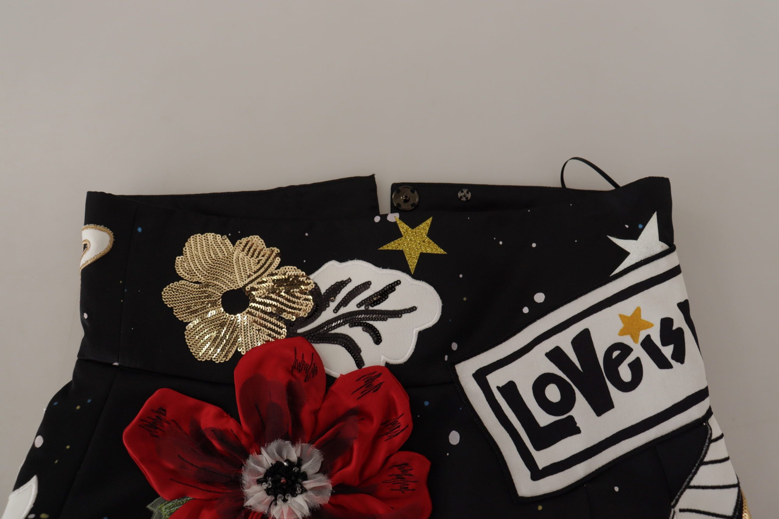 Zwarte Love Clock met pailletten pianorok