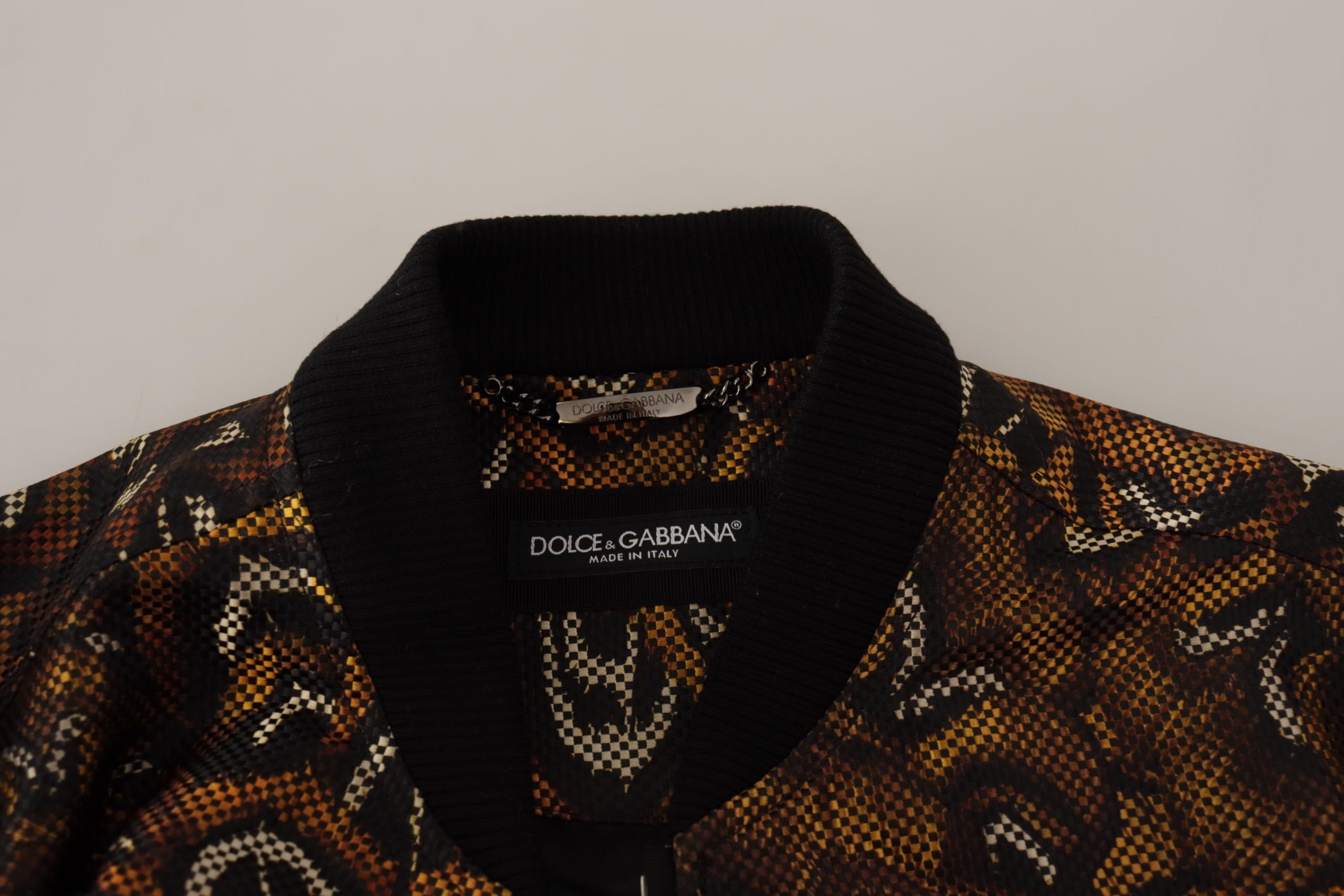 Bruine, doorlopende ritsblouse met veren