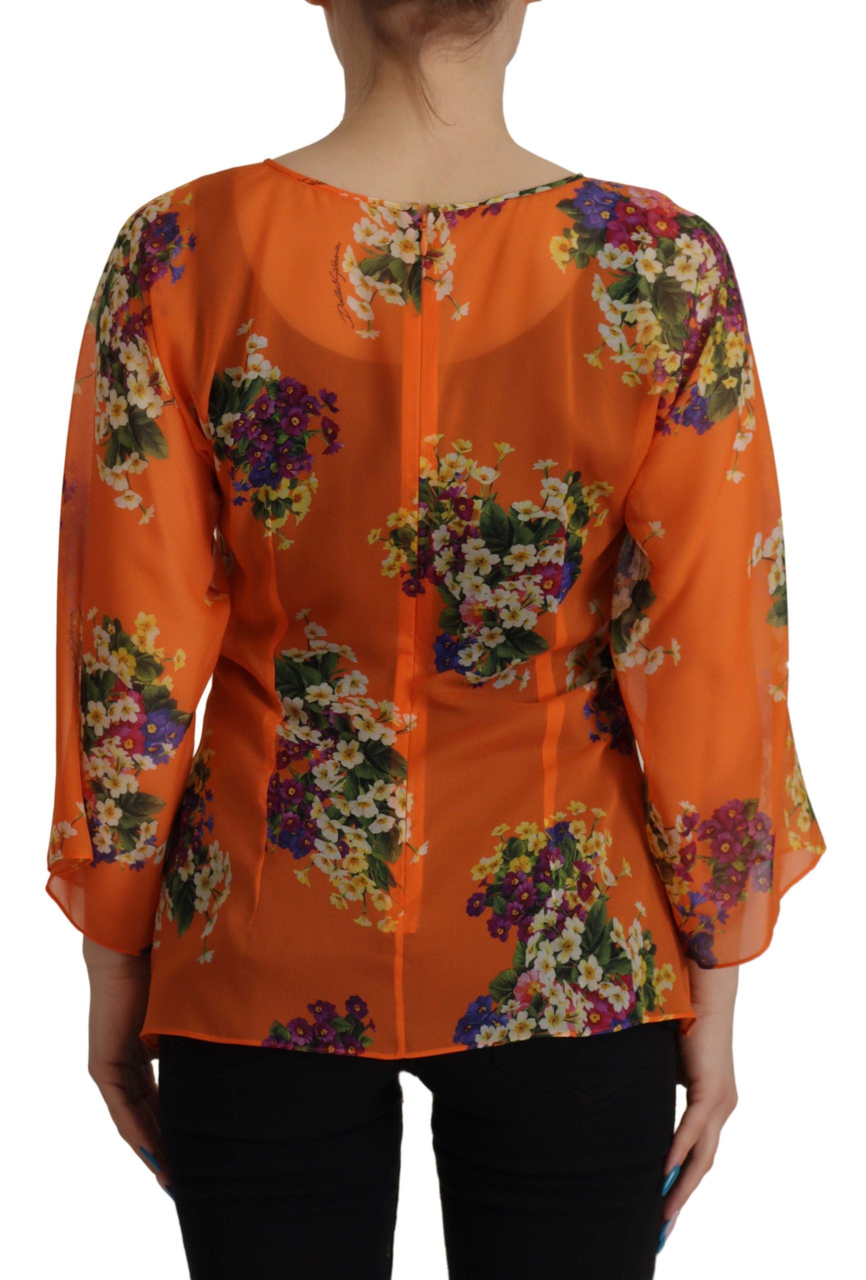Oranje blouse met bloemenprint en lange mouwen
