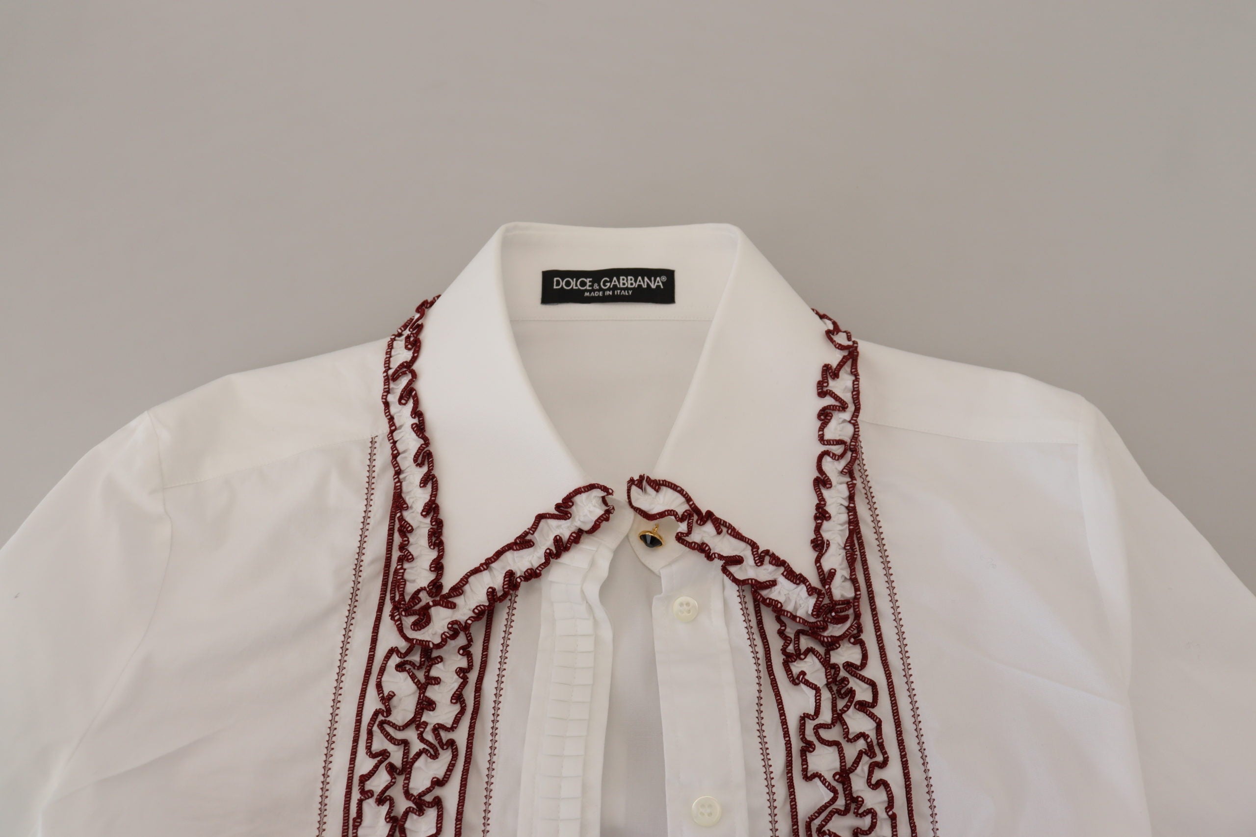 Witte top met lange mouwen en rucheskraag van kant