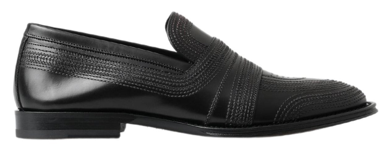 Zwarte leren pantoffels met stiksels
