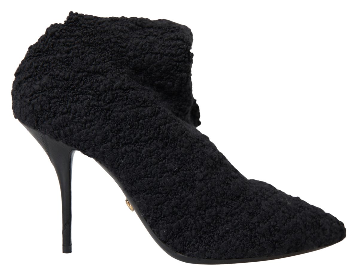 Zwarte stiletto hakken, halfhoge laarzen