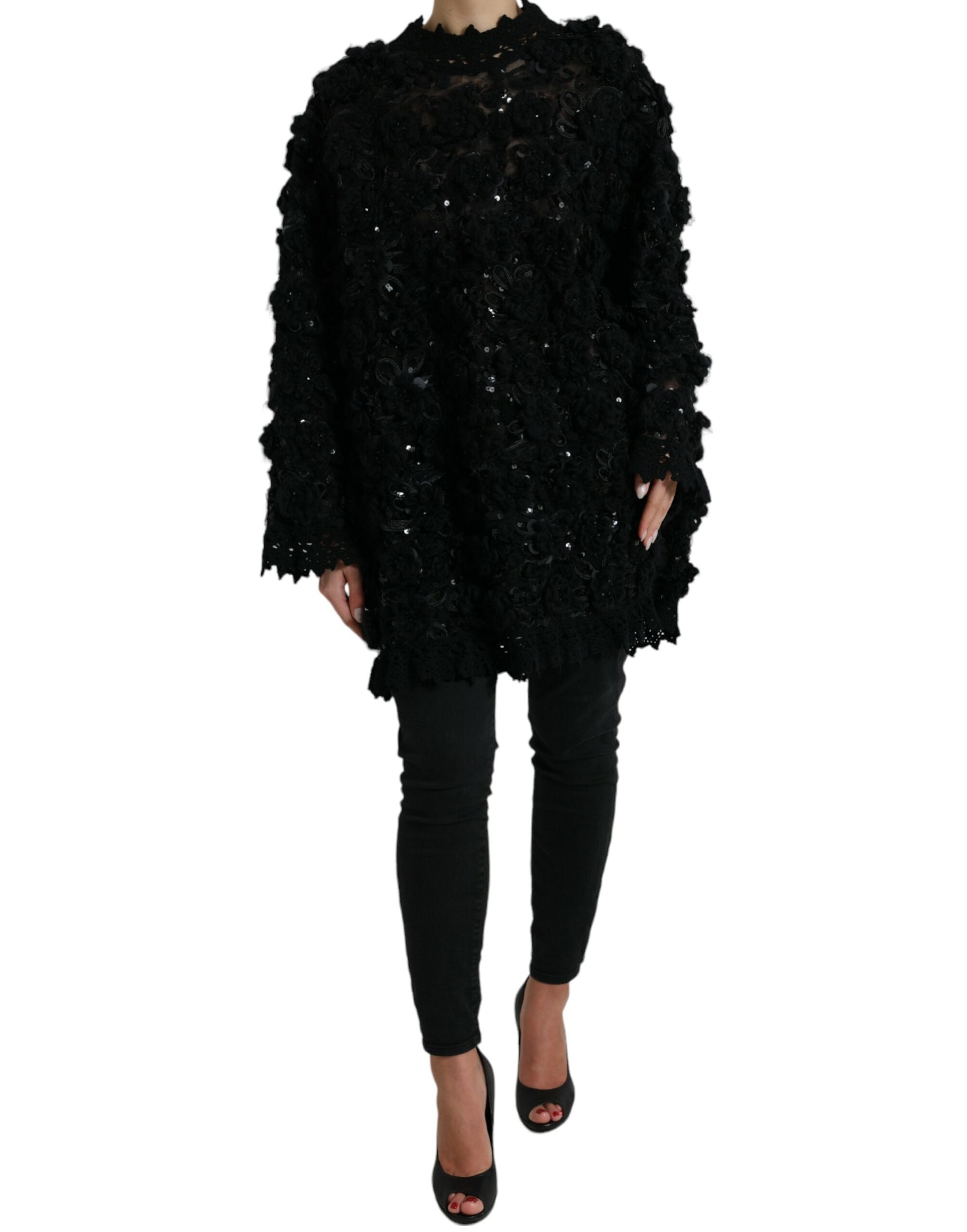 Zwarte met pailletten versierde pullover