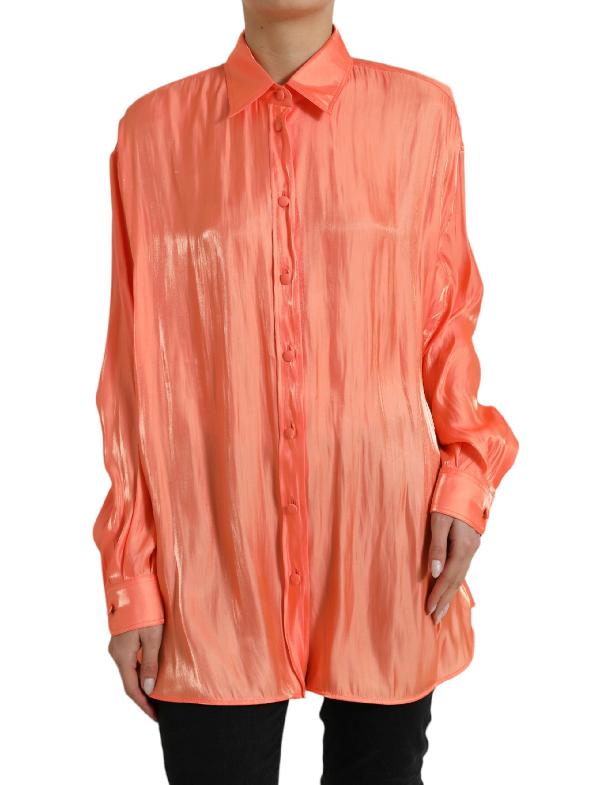 Perzikkleurige blouse met lange mouwen en knoopjes