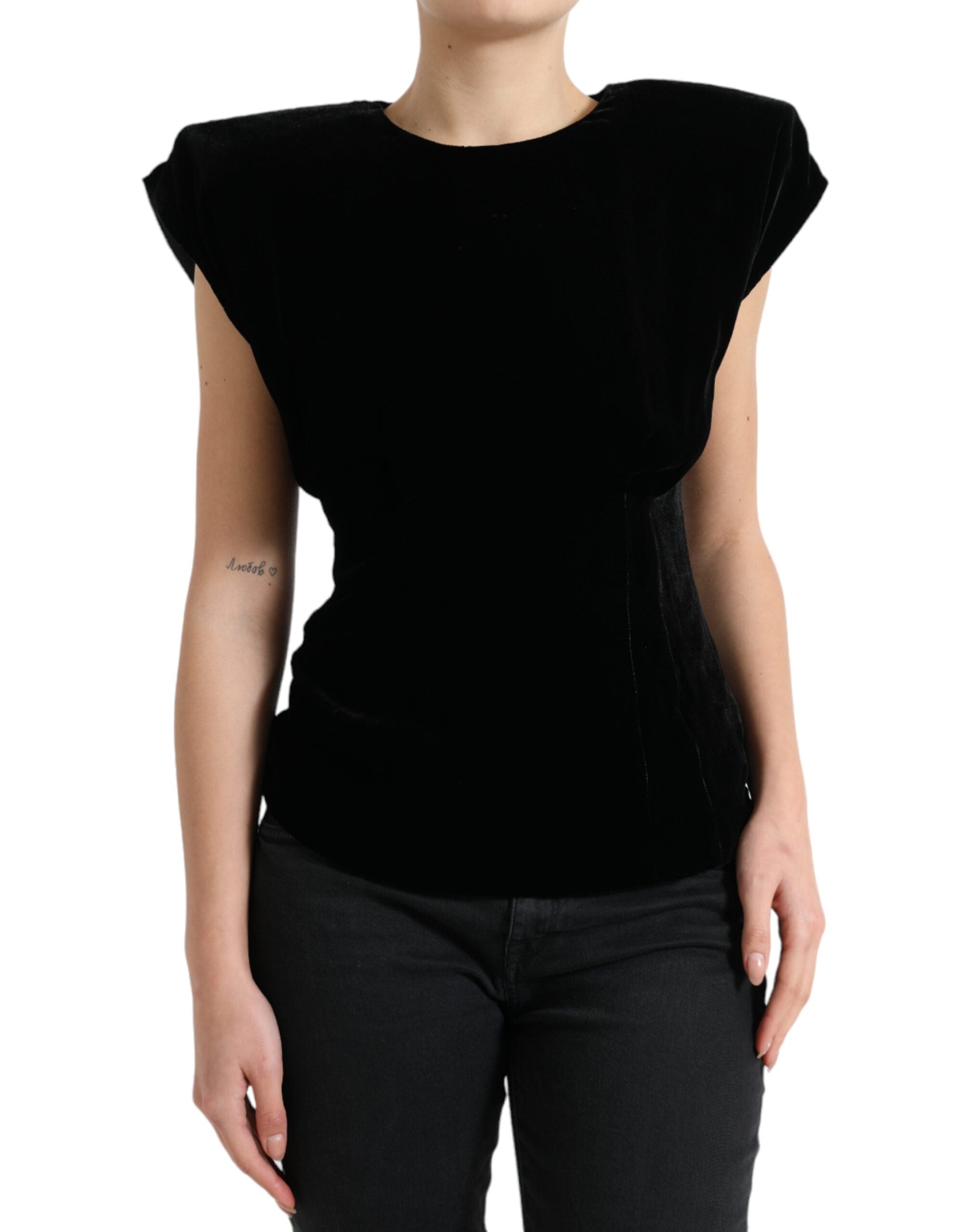 Zwarte fluwelen blouse met gewatteerde schoudervullingen