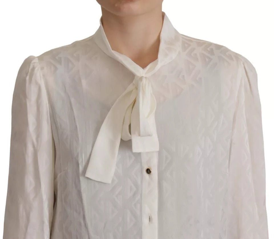 Witte blousetop met zijden Ascot-kraag en patroon