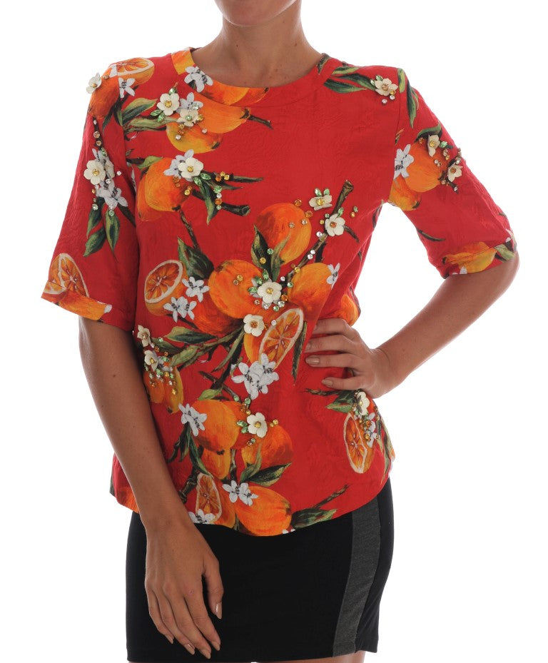 Blouse met oranje print en kristallen