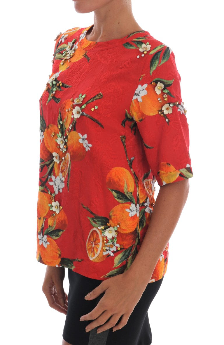 Blouse met oranje print en kristallen