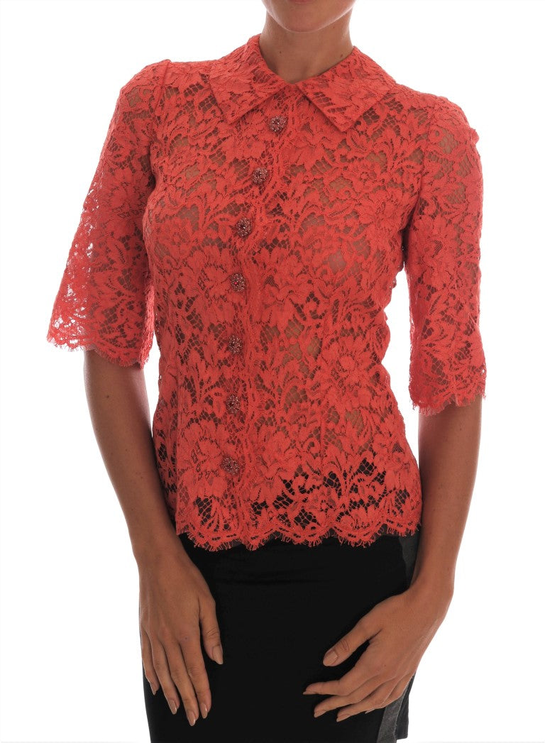 Oranje blouse met kristallen knopen en bloemenkant