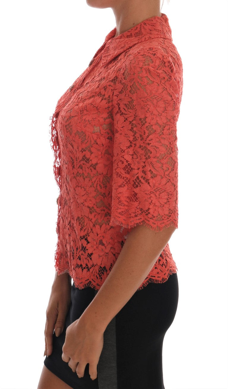Oranje blouse met kristallen knopen en bloemenkant