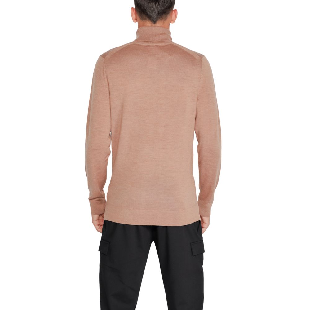 Beige wollen coltrui
