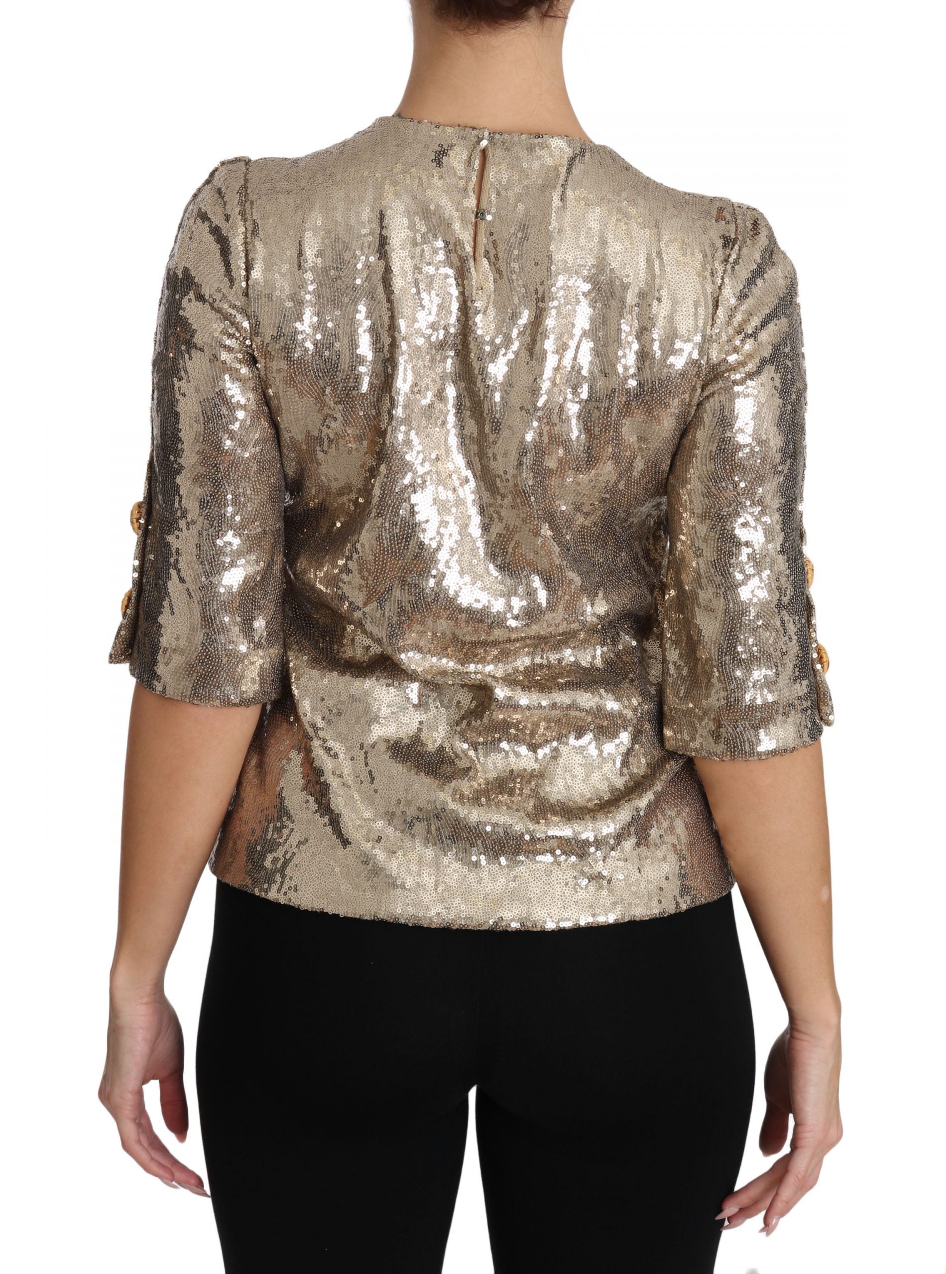 Goudkleurige blouse met pailletten en papegaaikristal