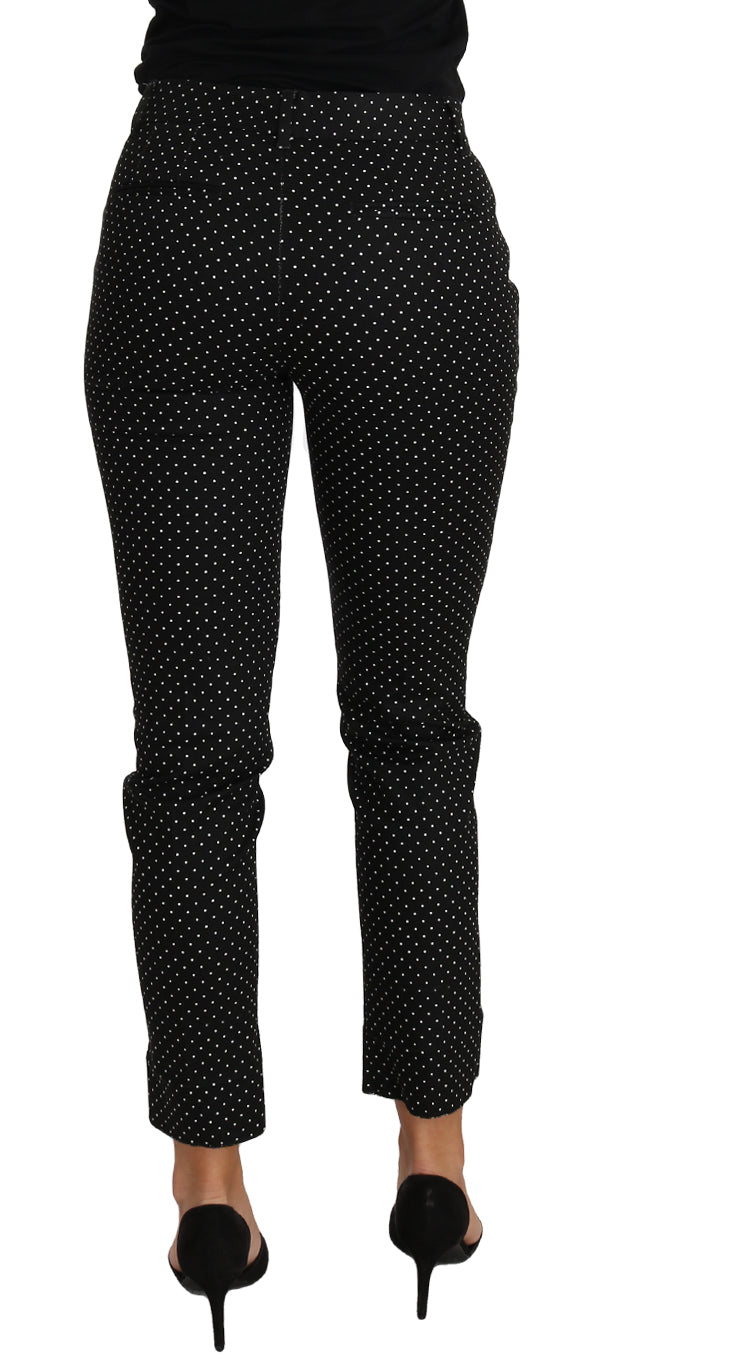 Zwarte jurk met stippen en rechte broek