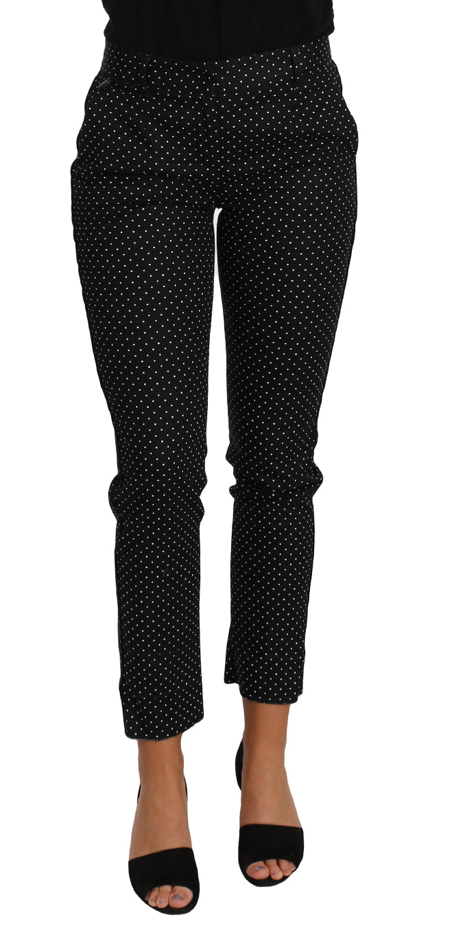 Zwarte jurk met stippen en rechte broek