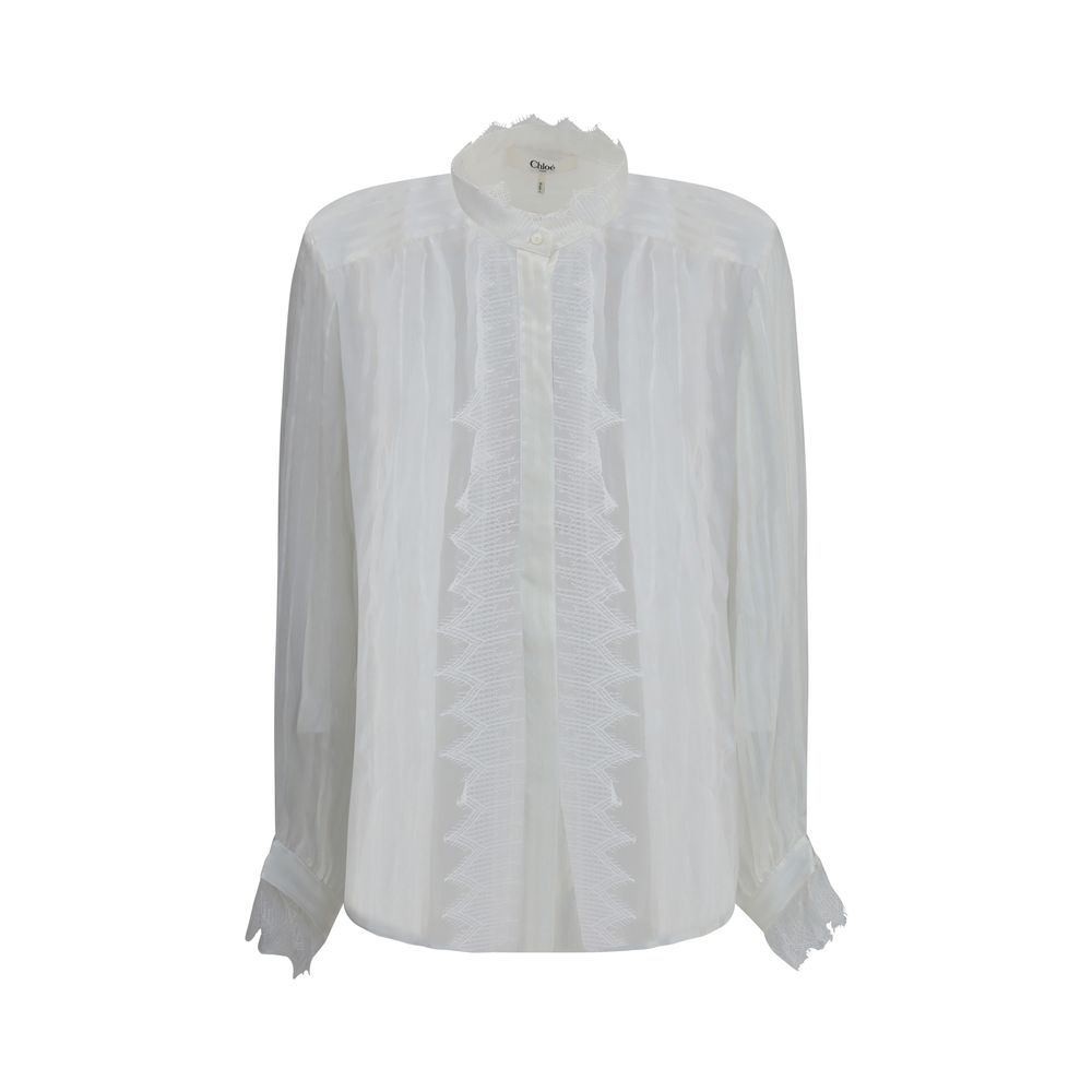 Blouse van geplooide zijden mousseline en kant